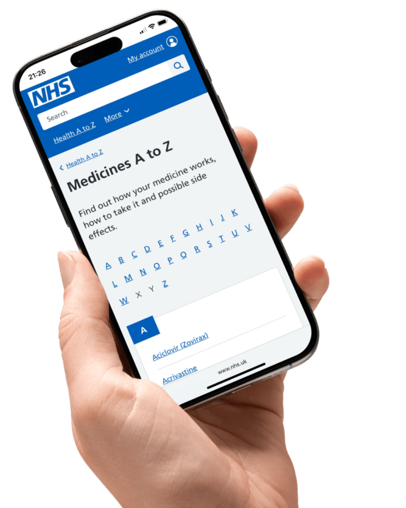 A hand holding a mobile phone with the NHS Medicines A-Z webpage loaded.