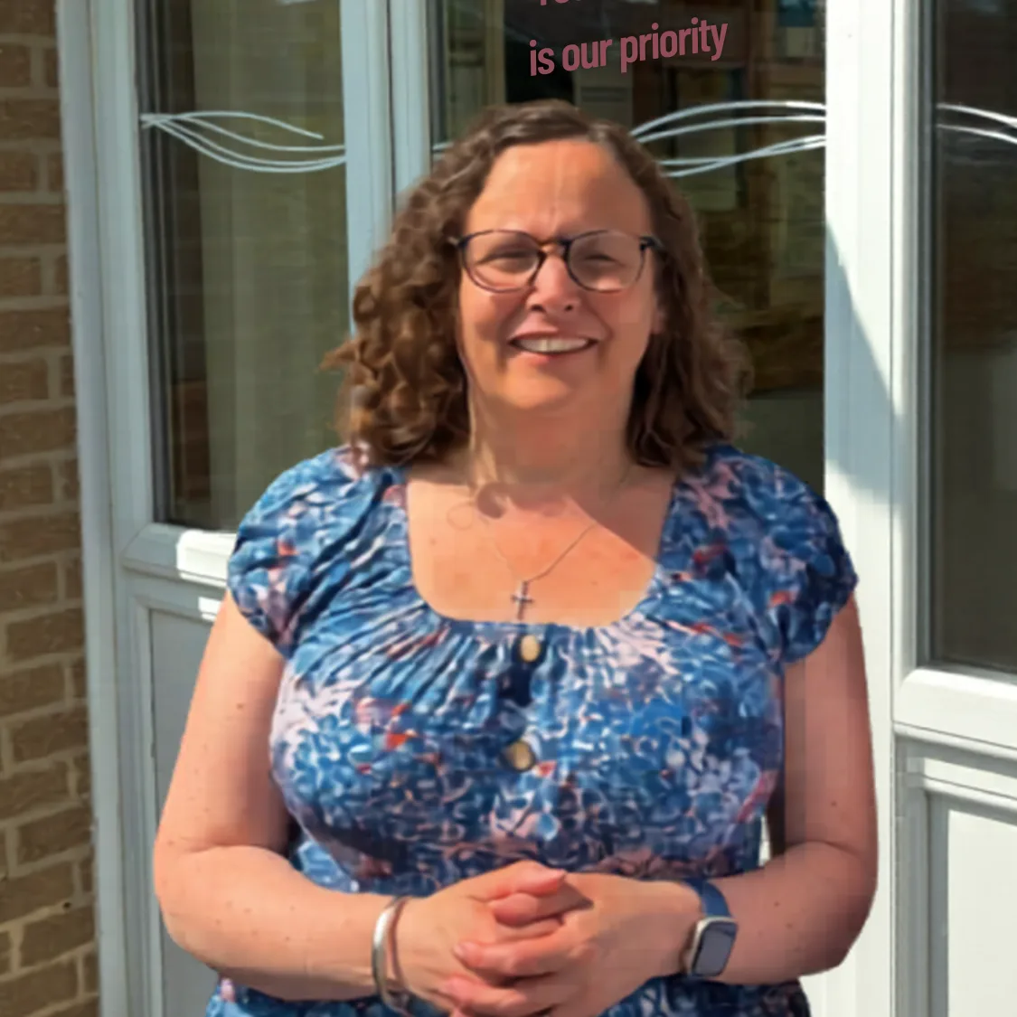 Image of Sharon standing outside Pegswood Pharmacy.
